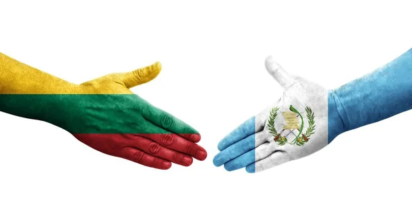 Handslag Mellan Guatemala Och Litauen Flaggor Målade Händer Isolerad Transparent — Stockfoto