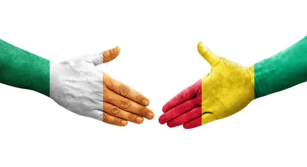 Gine Rlanda Bayrakları Arasındaki Sıkışma Ellerinde Resmedilmiş Şeffaf Görüntü — Stok fotoğraf