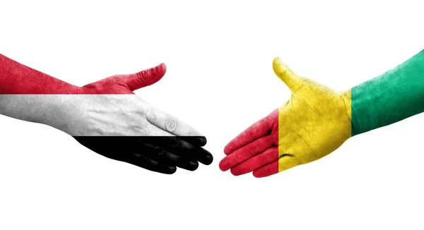 Handdruk Tussen Guinee Jemen Vlaggen Geschilderd Handen Geïsoleerd Transparant Beeld — Stockfoto