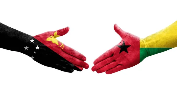 Handshake Guinea Bissau Papua New Guinea Flags Painted Hands Isolated — Stock Photo, Image