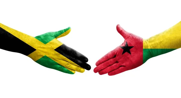 Håndtrykk Mellom Guinea Bissau Jamaica Flagg Malt Hender Isolert Transparent – stockfoto