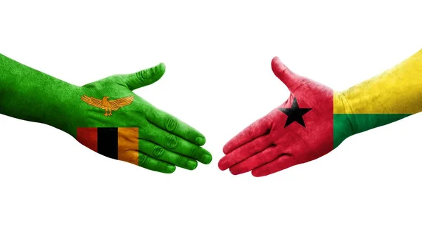 Aperto Mão Entre Guiné Bissau Bandeiras Zâmbia Pintadas Mãos Imagem — Fotografia de Stock