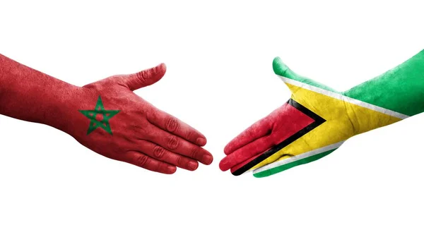 Apretón Manos Entre Guyana Marruecos Banderas Pintadas Las Manos Imagen — Foto de Stock