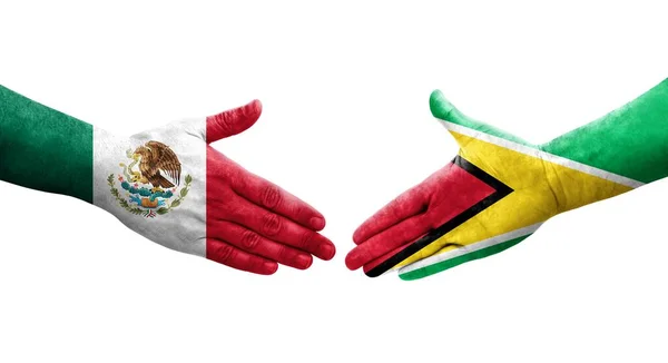 Χειραψία Μεταξύ Γουιάνας Και Μεξικού Σημαίες Ζωγραφισμένα Στα Χέρια Απομονωμένη — Φωτογραφία Αρχείου