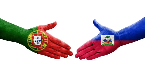 Händedruck Zwischen Haiti Und Portugal Fahnen Auf Händen Gemalt Isoliertes — Stockfoto