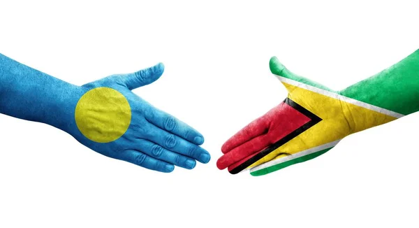 Poignée Main Entre Les Drapeaux Guyana Palaos Peints Sur Les — Photo