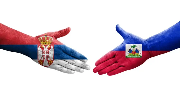 Handdruk Tussen Haïti Servië Vlaggen Geschilderd Handen Geïsoleerd Transparant Beeld — Stockfoto