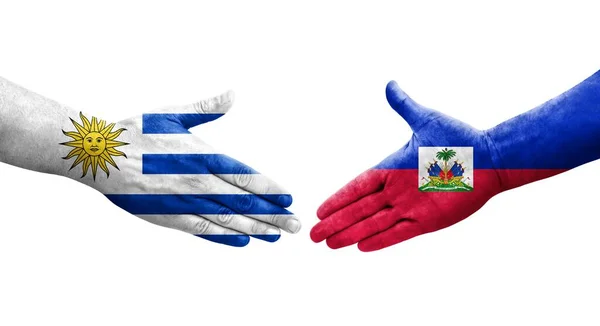 Mano Apretada Entre Haití Uruguay Banderas Pintadas Las Manos Imagen —  Fotos de Stock