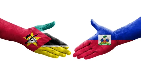 Рукостискання Між Прапорами Гаїті Мозамбіку Намальоване Руках Ізольоване Прозоре Зображення — стокове фото