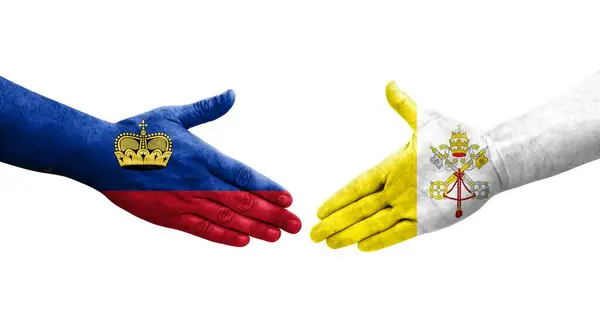 stock image Handshake between Holy See and Liechtenstein flags painted on hands, isolated transparent image.