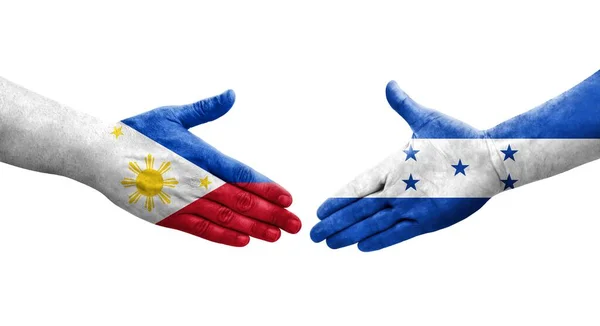 Uścisk Dłoni Między Hondurasem Filipinami Flagi Malowane Rękach Odizolowany Przezroczysty — Zdjęcie stockowe