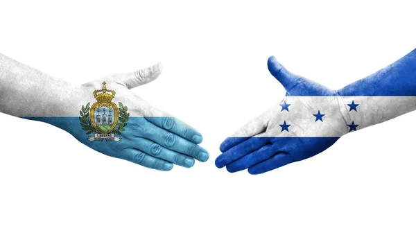 Рукостискання Між Гондурасом Прапором Сан Марино Намальованим Руках Ізольованим Прозорим — стокове фото