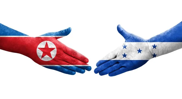 Χειραψία Μεταξύ Ονδούρας Και Βόρειας Κορέας Σημαίες Ζωγραφισμένα Στα Χέρια — Φωτογραφία Αρχείου
