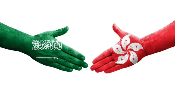 Handdruk Tussen Hongkong Saoedi Arabië Vlaggen Geschilderd Handen Geïsoleerd Transparant — Stockfoto