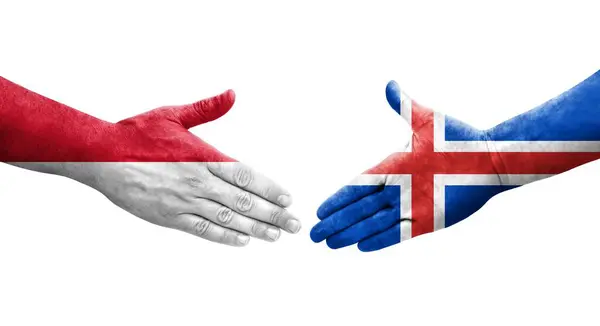冰岛和摩纳哥之间的握手 手绘国旗 孤立透明的图像 — 图库照片