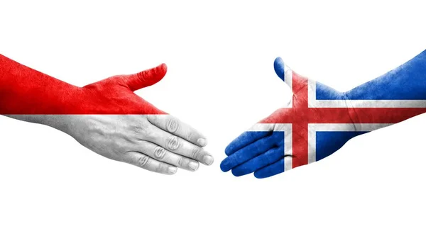 冰岛和印度尼西亚之间的握手 手绘国旗 孤立透明的图像 — 图库照片