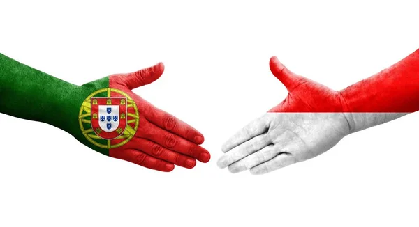 Handdruk Tussen Indonesië Portugal Vlaggen Handen Geschilderd Geïsoleerd Transparant Beeld — Stockfoto