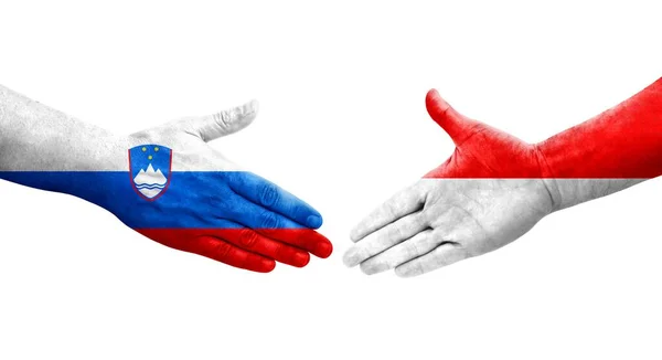 Handslag Mellan Indonesien Och Slovenien Flaggor Målade Händer Isolerad Transparent — Stockfoto