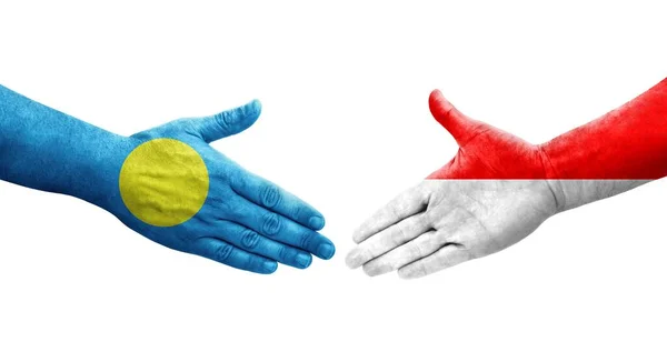 Χειραψία Μεταξύ Ινδονησίας Και Palau Σημαίες Ζωγραφισμένα Στα Χέρια Απομονωμένη — Φωτογραφία Αρχείου