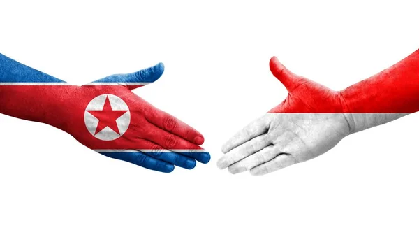 Apretón Manos Entre Indonesia Corea Del Norte Banderas Pintadas Las — Foto de Stock