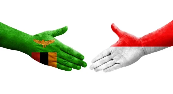 Uścisk Dłoni Między Indonezją Zambią Flagi Malowane Rękach Odizolowany Przezroczysty — Zdjęcie stockowe