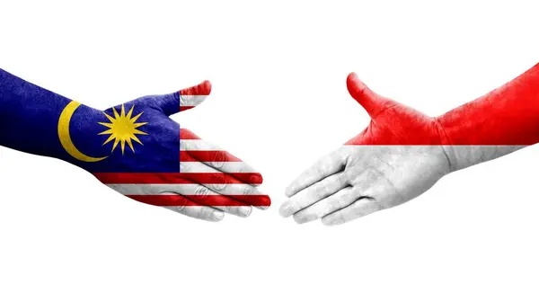 Handshake Indonesia Malaysia Flags Painted Hands Isolated Transparent Image — Stock Photo, Image