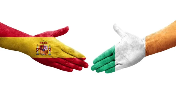 아일랜드 스페인 손으로 깃발을 악수하는 고립된 이미지 — 스톡 사진
