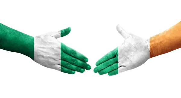 아일랜드와 지리아 사이에서 손으로 깃발을 흔들면서 분리되어 이미지 — 스톡 사진
