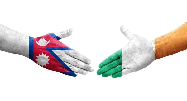 Рукопожатие Между Флагом Ирландии Непала Нарисованное Руках Изолированное Прозрачное Изображение — стоковое фото