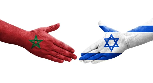 手に描かれたイスラエルとモロッコの旗の間の握手 孤立した透明なイメージ — ストック写真