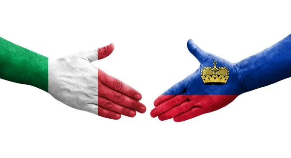 Uścisk Dłoni Między Włochami Liechtensteinem Flagi Malowane Rękach Odizolowany Przezroczysty — Zdjęcie stockowe