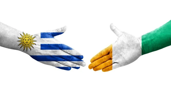 手绘象牙海岸和乌拉圭国旗之间的握手 孤立透明的形象 — 图库照片