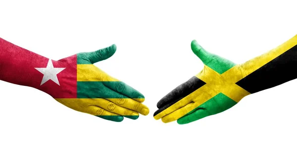 Apretón Manos Entre Jamaica Togo Banderas Pintadas Las Manos Imagen — Foto de Stock
