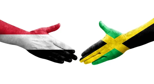 Ellerinde Jamaika Yemen Bayrakları Arasında Sıkışma Izole Şeffaf Görüntü — Stok fotoğraf