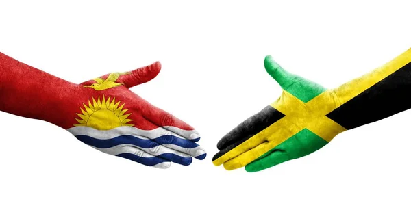 Handslag Mellan Jamaica Och Kiribati Flaggor Målade Händer Isolerad Transparent — Stockfoto