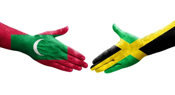 Рукопожатие Между Ямайкой Мальдивскими Флагами Нарисованное Руках Изолированное Прозрачное Изображение — стоковое фото