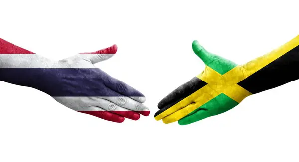 Рукопожатие Между Ямайкой Таиландом Флаги Нарисованные Руках Изолированные Прозрачное Изображение — стоковое фото