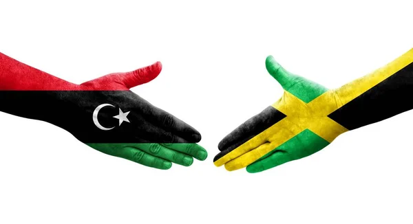 Håndtrykk Mellom Jamaica Libya Flagg Malt Hender Isolert Transparent Bilde – stockfoto