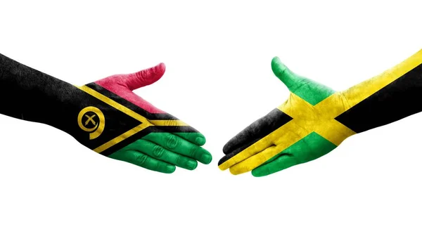 手に描かれたジャマイカとバヌアツの旗の間の握手 隔離された透明なイメージ — ストック写真