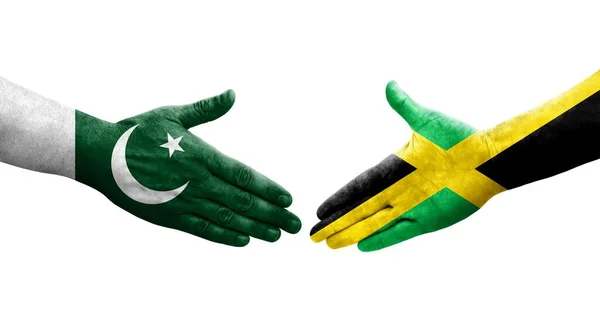 Händedruck Zwischen Jamaikanischen Und Pakistanischen Flaggen Auf Hände Gemalt Isoliertes — Stockfoto