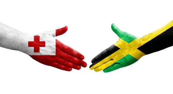 Apretón Manos Entre Jamaica Tonga Banderas Pintadas Las Manos Imagen —  Fotos de Stock