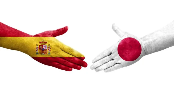 Uścisk Dłoni Między Japonią Hiszpanią Flagi Malowane Rękach Odizolowany Przezroczysty — Zdjęcie stockowe