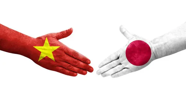 Handslag Mellan Japan Och Vietnam Flaggor Målade Händer Isolerad Transparent — Stockfoto
