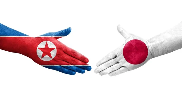 Stretta Mano Tra Giappone Corea Del Nord Bandiere Dipinte Mani — Foto Stock
