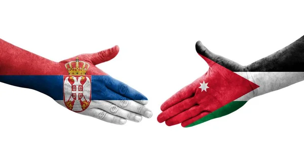 Händedruck Zwischen Jordanischen Und Serbischen Flaggen Auf Hände Gemaltes Isoliertes — Stockfoto