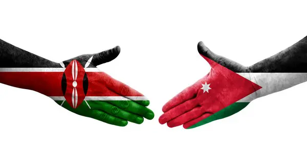 Poignée Main Entre Jordanie Kenya Drapeaux Peints Sur Les Mains — Photo
