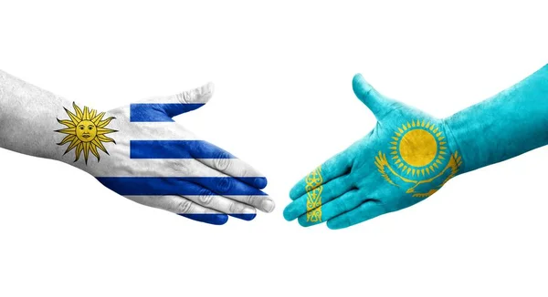 Рукопожатие Между Казахстанскими Уругвайскими Флагами Раскрашенными Руках Изолированное Прозрачное Изображение — стоковое фото