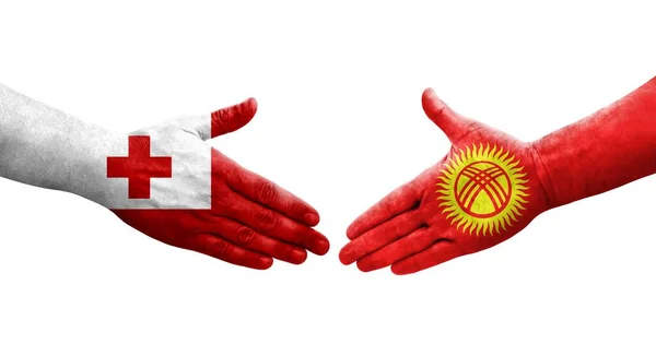 Handdruk Tussen Kirgizië Tonga Vlaggen Geschilderd Handen Geïsoleerd Transparant Beeld — Stockfoto