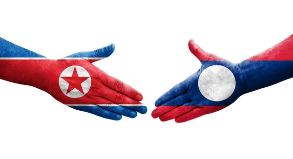 Aperto Mão Entre Laos Bandeiras Coreia Norte Pintadas Mãos Imagem — Fotografia de Stock