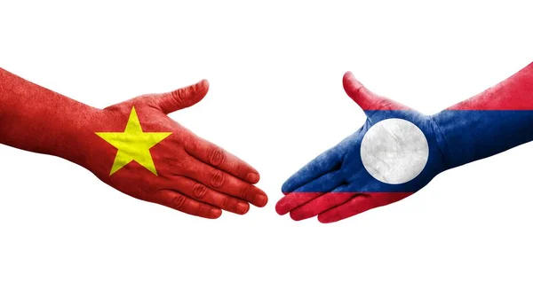 stock image Handshake between Laos and Vietnam flags painted on hands, isolated transparent image.